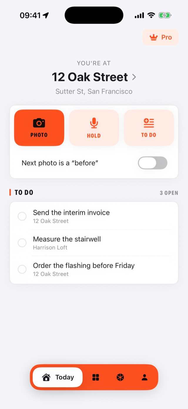 The BuildShot home screen. It says “You're at 12 Oak Street”, with three large buttons — photo, hold to talk, and to do — and the day's to-do list underneath.